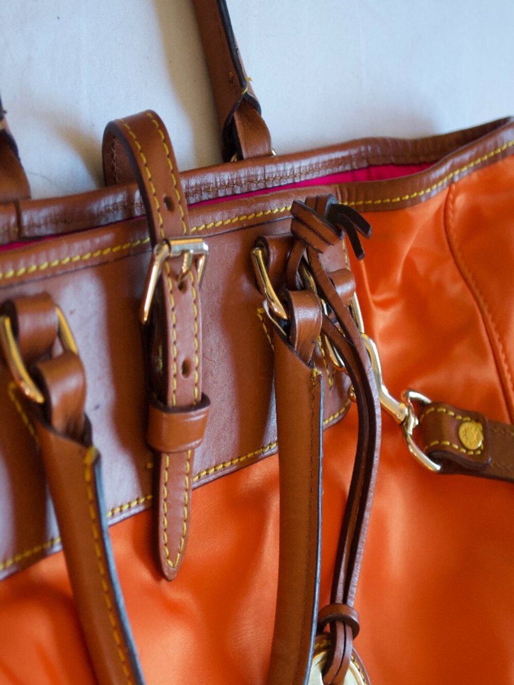 Dooney& Bourke “Nylon Editor’s Tote” in Orange with Leather Trim and Pink Lining - Picture 9 of 10